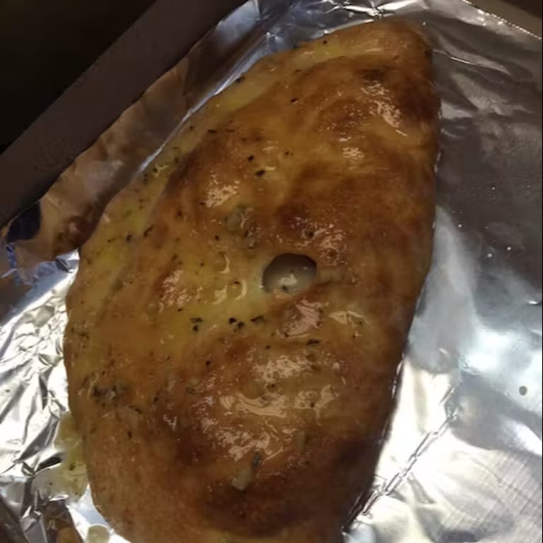 Savor Our Calzone Today